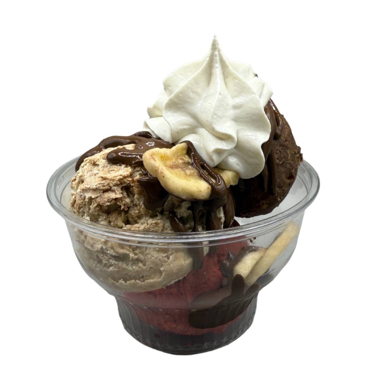 Ice cream sundae with whipped cream, chocolate sauce, and cookies in a clear container 
